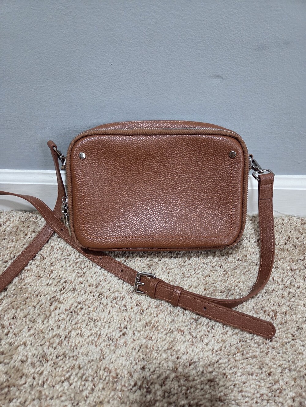Compact Pebbled Leather Crossbody Bag in Cognac